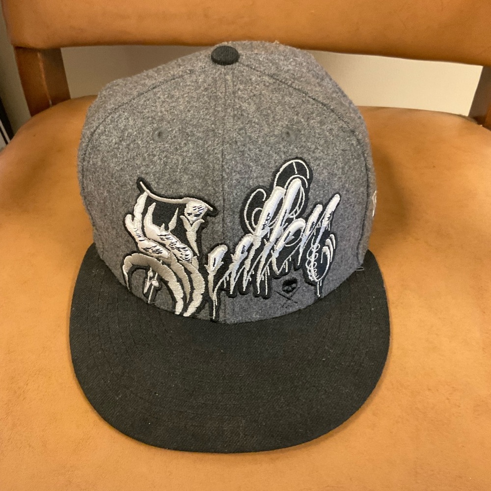 Sullen charcoal grey cap with cursive “Sullen” logo, one size fits most
